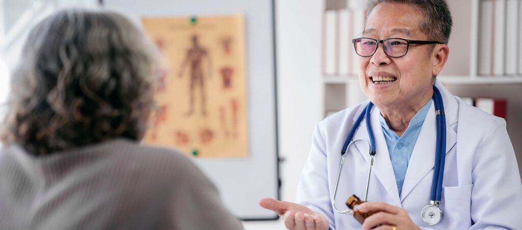 Primary care physician consults with older female patient who is considering a GLP-1 prescription for both diabetes management and weight loss