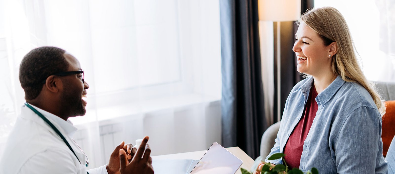 Medical weight loss patient chatting with her obesity medicine provider during a routine consult for a GLP-1 prescription